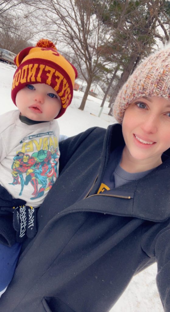 Hailey and her baby enjoy a snowy day.